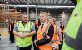 New Zealand’s PM gets to see the benefits of LiBiao Robotics parcel sorting robots up close